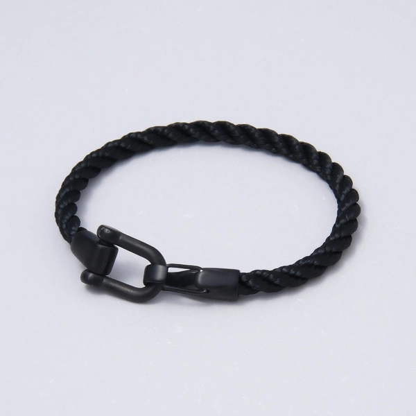 Męska bransoletka z plecionego ciemnego sznurka. MĘSKA RADOŚĆ