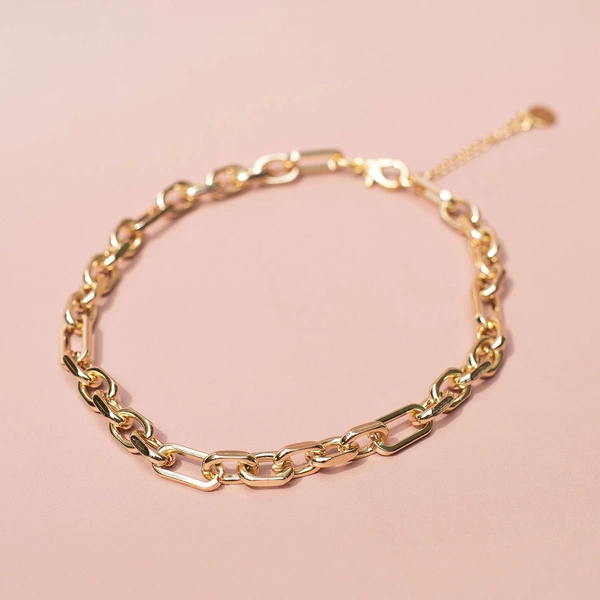 Naszyjnik z grubego pozłacanego łańcucha. W DROGĘ