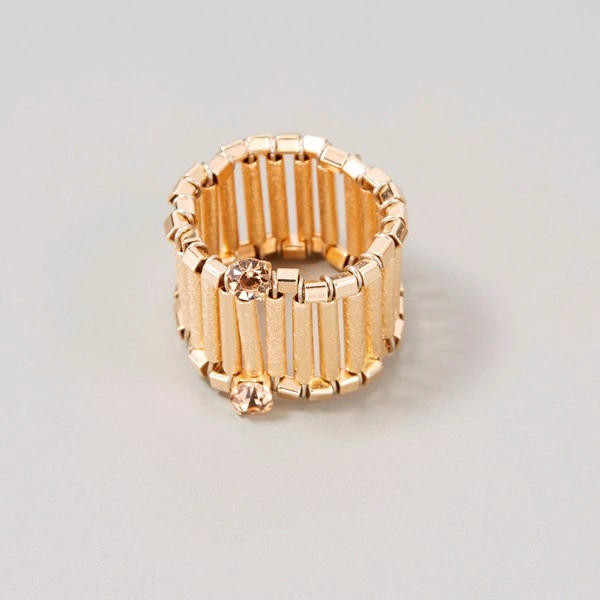 Pierscionek obrączka na gumce z pozłacanych rurek. PAROLES PAROLES