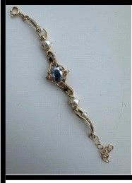 Złocona bransoletka z czterema perłami i kryształami. PARYSKA CUKIERNIA