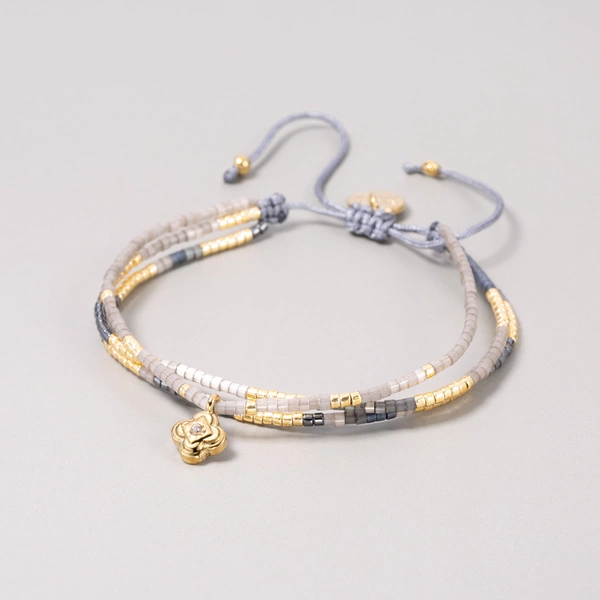 Bransoletka z paciorków Miyuki z zawieszką kwiatkiem. CHLOE