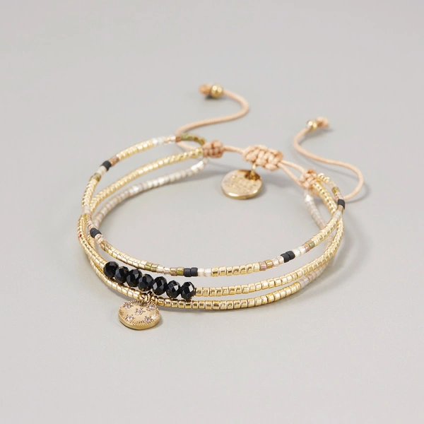 Trzyrzędowa bransoletka z koralików Miyuki z zawieszką. FETE A CANNES