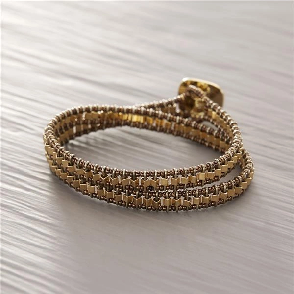 Podwójna bransoletka ze zlotych i miedzianych koralików. KORONKA MIEJSKA