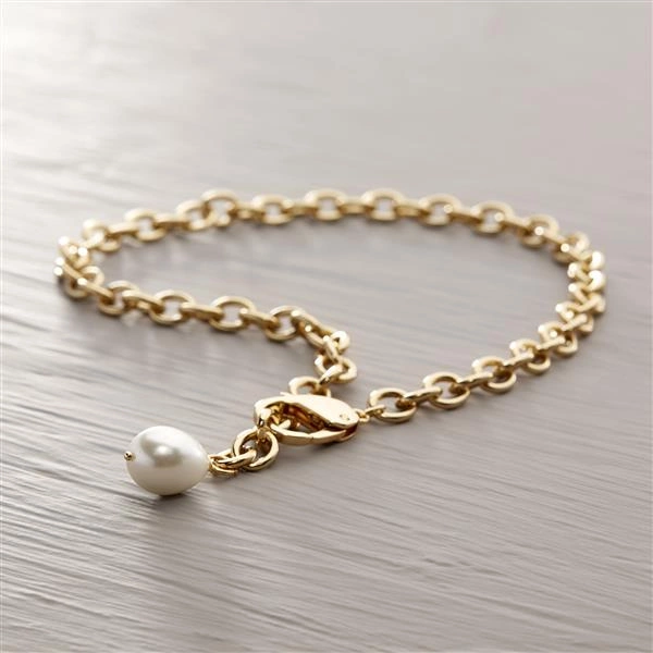 Pozłacany naszyjnik łańcuch zakończony okazałą perłą. ZAPAMIĘTASZ