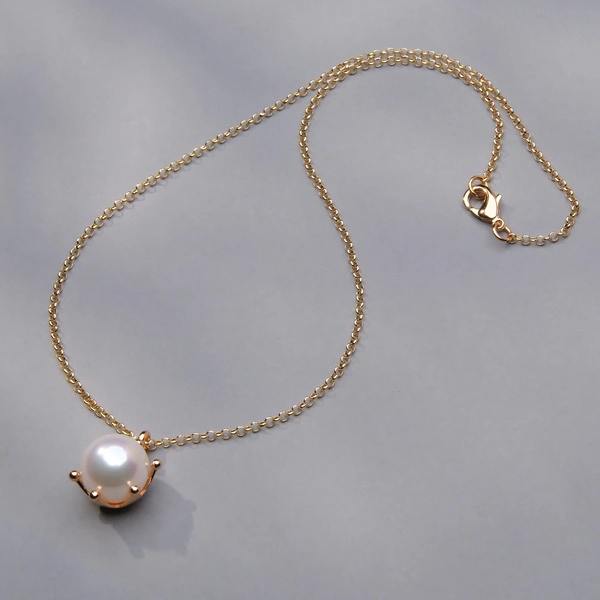 Złocony naszyjnik ze szklaną białą perłą w koronie. SŁOŃCE WE MNIE