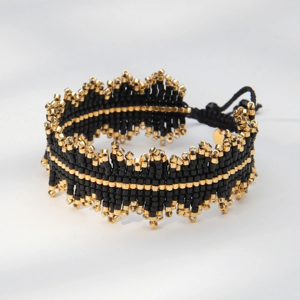 Bransoletka w formie korony tkana z czarnych paciorków Miyuki. POLA NEGRI