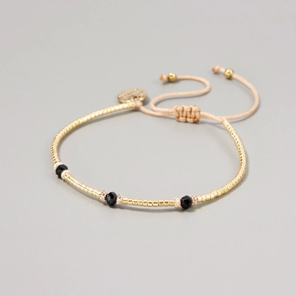 Bransoletka z paciorków Miyuki, z akcentami z onyksu. PROWANSJA SNÓW