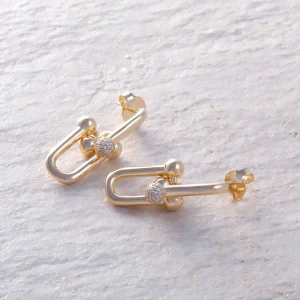 Pozłacane kolczyki w formie szekli z kulką z cyrkoniami. NA WODACH ATLANTYKU