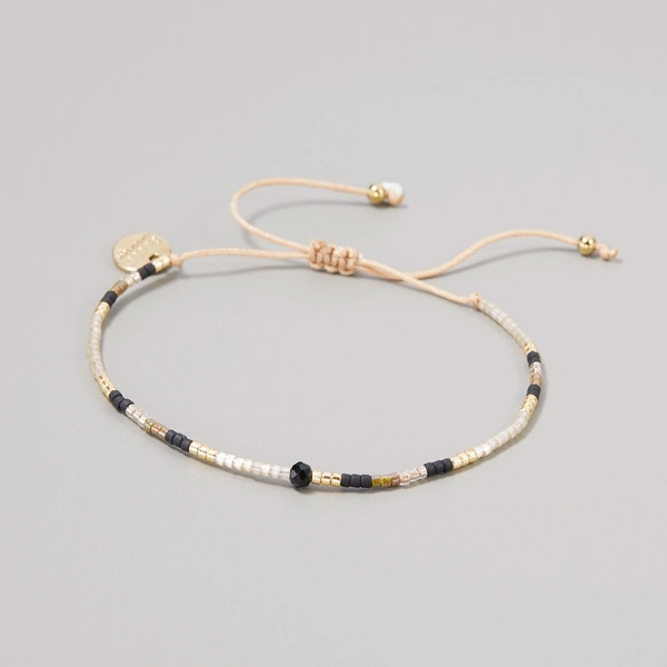 Bransoletka z paciorków Miyuki z akcentem z onyksu. HARMONIA PIĘKNA