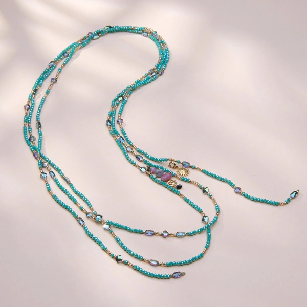 Naszyjnik z błękitnych spineli z kryształkami i zawieszkami. TURKUSOWE FALE