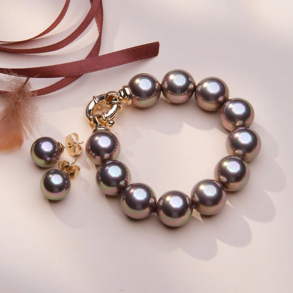 Zestaw bransoletka i kolczyki z pereł w kolorze mokka. MŁODA I ENERGICZNA